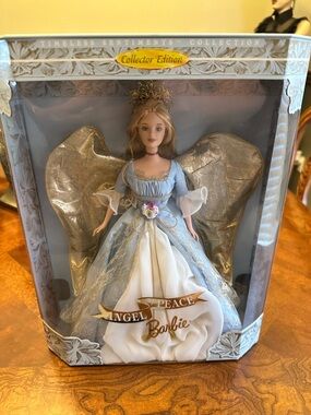 Barbie Angel of Peace in Light Blue and Gold

PRICE IS FIRM!